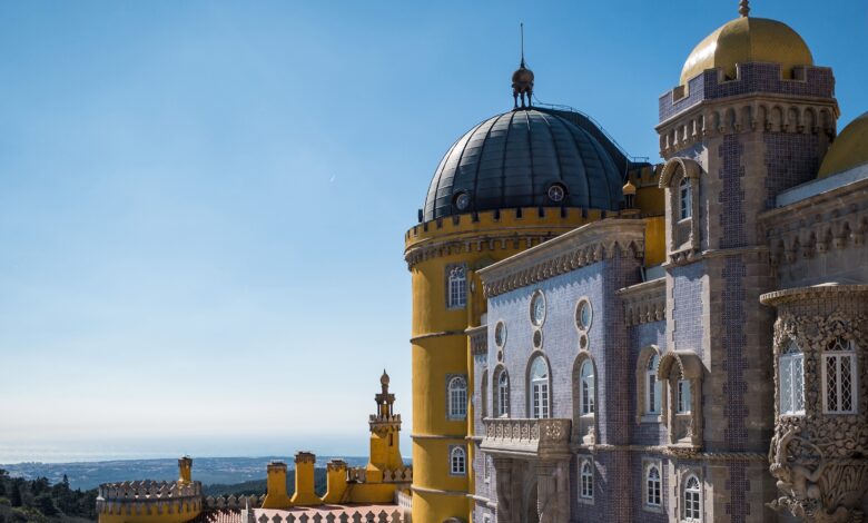 Castle in Sintra Cascais surrounded by greenery under the sunlight and a blue sky in Portugal