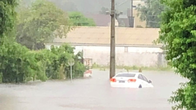 Rua inundada em Guaratuba foto portal da cidade