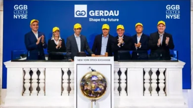 Executivos da Gerdau conduzindo a cerimônia do fechamento do mercado da NYSE. Crédito: Divulgação/Gerdau